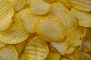 background from potato chips macro photo Top view. Flat lay