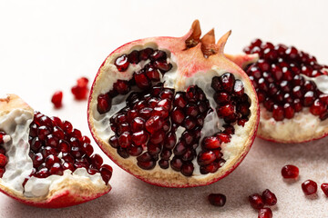 Pomegranate. Fresh organic juicy pomegranate fruit pieces. Pomegranate seeds, grains.
