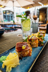 Overhead view of platter of sushi rolls