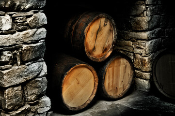 Wooden Wine Barrels in a Cellar