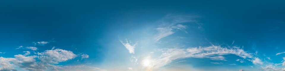Sky 360 panorama - Bright blue sky filled with fluffy white Cirrus clouds. Seamless hdr spherical 360 panorama. Sky dome sky replacement for aerial drone 360 panoramas. Weather and climate change
