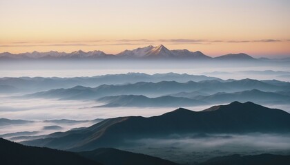 Obraz premium mountain layers and sunrise view in cold and foggy weather. 