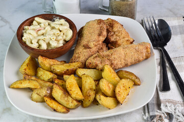 chicken tenders  served with potato wedges