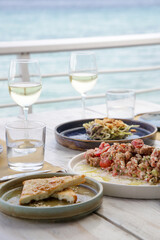 Various Mediterranean dishes served on the restaurant table