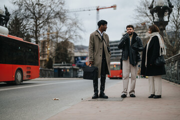 A international group of business associates engage in a conversation on a bustling city sidewalk, illustrating teamwork and collaboration in an urban setting.