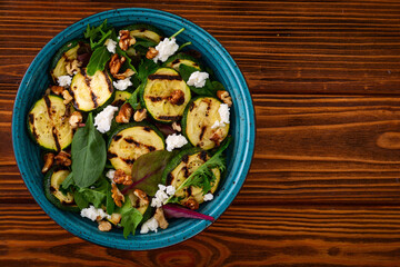 Healthy vegetarian food . Grilled green zucchini salad . . Food background