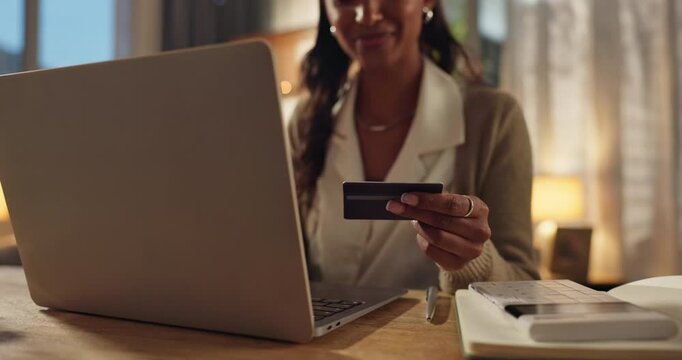Businesswoman, home and hands on laptop with credit card for online shopping, discount and sale. Bookkeeper, ecommerce and typing on fintech app or banking with rewards, voucher code and savings