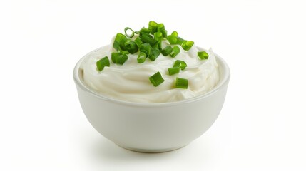 Bowl of sour cream with chopped green onions on white background, culinary concept