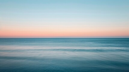 Fototapeta premium Minimalist coastal scene at sunrise, highlighting serene beauty, in a style blending documentary, editorial, and magazine photography