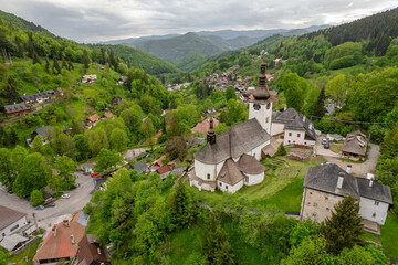 Aerial view of an old christian church in Spania Dolina village, Slovakia.