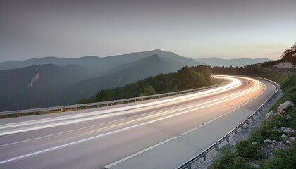 Fototapeta premium Curving light trails on a dark road captured with long exposure, illustrating the dynamic energy and speed of nighttime transportation and the vibrant glow of moving vehicles