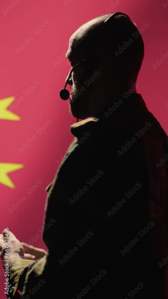 Poster vertical video military dispatcher providing informations for troops on war front lines, talking in 