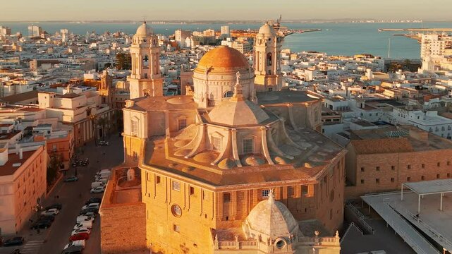 Aerial view of the Cathedral de Santa Cruz at sunset in Cadiz, Andalusia, Spain.