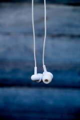 wired earbuds with blur background