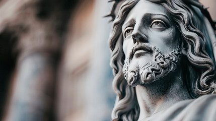 Close-up of a detailed statue of Jesus Christ with a serene expression, located in a church. The image emphasizes the intricate facial features and evokes a sense of peace and spirituality. 