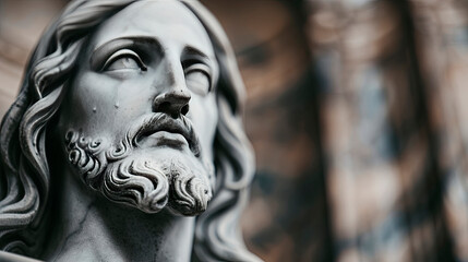 Close-up of a detailed statue of Jesus Christ with a serene expression, located in a church. The image emphasizes the intricate facial features and evokes a sense of peace and spirituality. 