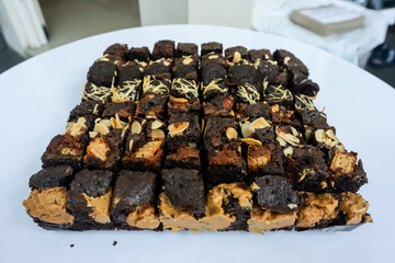 Chocolate brownies cake with various topping