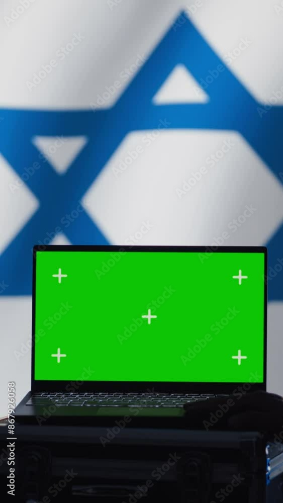 Poster vertical video israel air defense command operator conscript using radar on green screen laptop to d