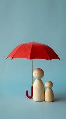 Wooden figures holding a red umbrella against blue background, minimalistic family protection concept