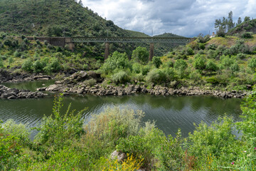 Obraz premium Railway bridge under the river Ocreza, Amieira do tejo, fratel District of Castelo Branco