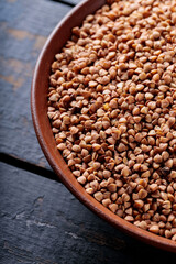 Buckwheat Grains on Plate, Healthy Cereal Concept, Close Up
