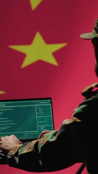 Vertical video Chinese programmer making bot accounts on social networks promoting communist ideology. Technician working for CCP intelligence agency building algorithms to spread fake news