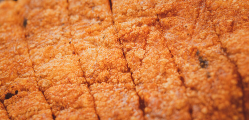 A close up of a piece of fried food with a lot of texture