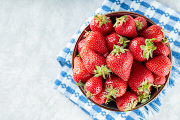 Ripe Strawberries in Bowl on Blue-White Checkered Napkin, Copy Space