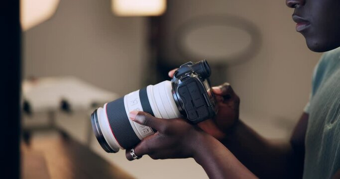 Photographer, camera and man in studio for .photography, media and magazine brand as creative. Cameraman, focus and black person backstage for shooting, filming and production as employee with lens