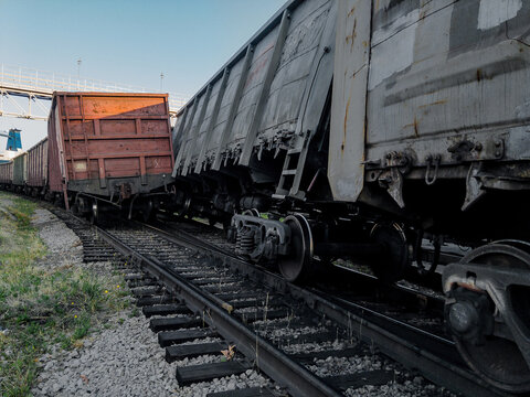 Traffic accident on the railway. As a result of a train accident, the train derailed. An accident on the railway. A railway carriage derailed during daylight hours. The wreck of railway wagons.