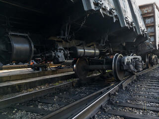 An accident on the railway. A railway carriage derailed during daylight hours. The railway car as a result of the accident came off the rails. Traffic accident on the railway.