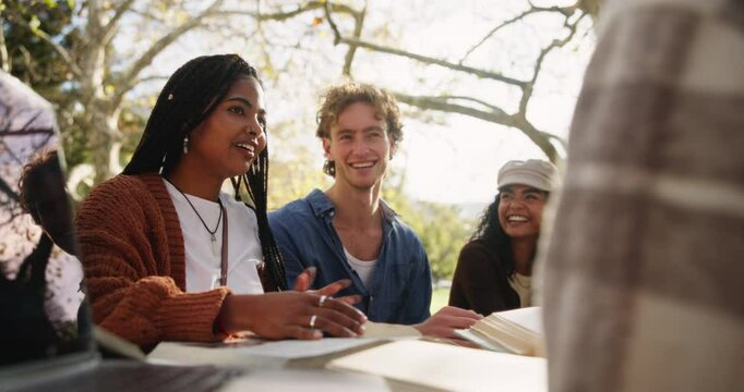 Students, laptop and talking outdoor for study break with books and learn for english assessment or test. Computer, gen z people and friends conversation in park for college education and knowledge