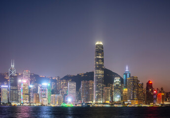 Fototapeta premium Hong Kong downtown skyline across Victoria harbor at night, Hong Kong, China.