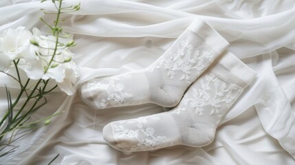 Cotton socks with white design on a white backdrop