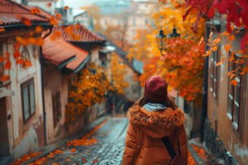 Obraz premium Korean woman exploring a cobblestone street in Prague, colorful autumn trees lining the path, [European charm], [fall travel]