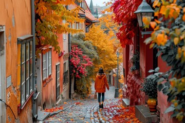 Korean woman exploring a cobblestone street in Prague, colorful autumn trees lining the path, [European charm], [fall travel]