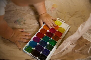 sister and brother hugging