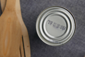 expire date on food can on white background ,