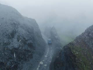 Driving car off road on high altitude mountains 627