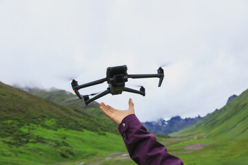 Drone flying in high altitude mountains