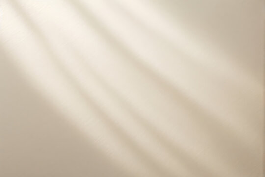  Beautiful texture of beige brown luxury, smooth stucco wall with soft foliage dappled light of tropical tree leaf shadow 