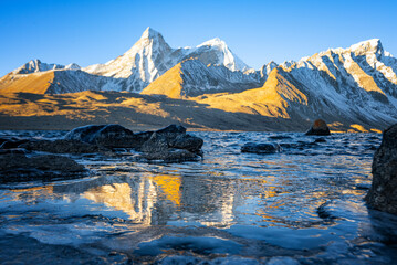 The lake in the morning with Ama Drime mountain of Himalaya