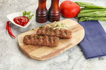 Kebab with beef served onion