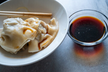 local dumplings and soy sauce in close-up