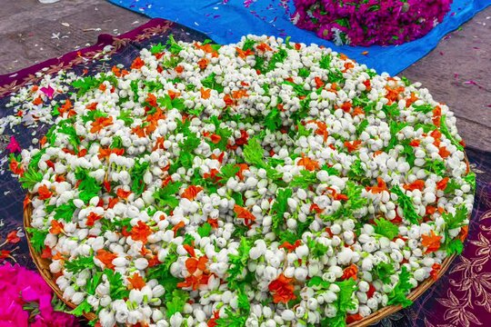 Jasmine flower or Jasminum officinale Flower role at The Devaraja Market: A Unique Heritage Market in Mysore, Karnataka, India. The market is on Sayaji Rao Road. The market was constructed in 1886.
