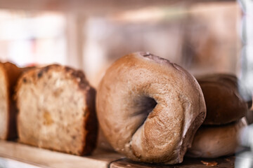 freshly baked banana bread and bagel in a cafe window