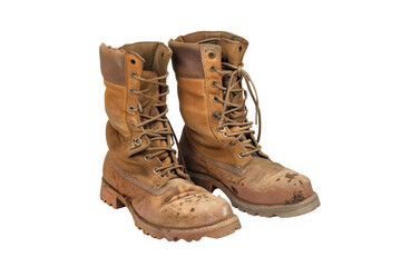 Pair of worn leather work boots with mud, isolated on a white background, showcasing durability and ruggedness.