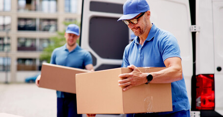 Certified technician unloading van, installing furniture in new home