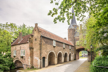 Fototapeta premium View at the Oostpoort Gate in the streets of Delft in Netherlands