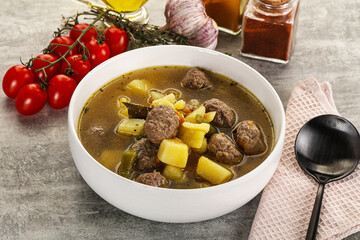 Soup with meatball and potato